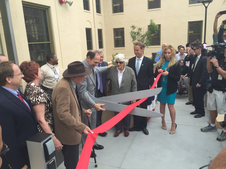 VA Secretary Bob McDonald cuts the ribbon opening the renovated Building 209 on the West LA Veterans Campus on June 4th 2015. The building will house 65 vets and cost $20 million to renovate.