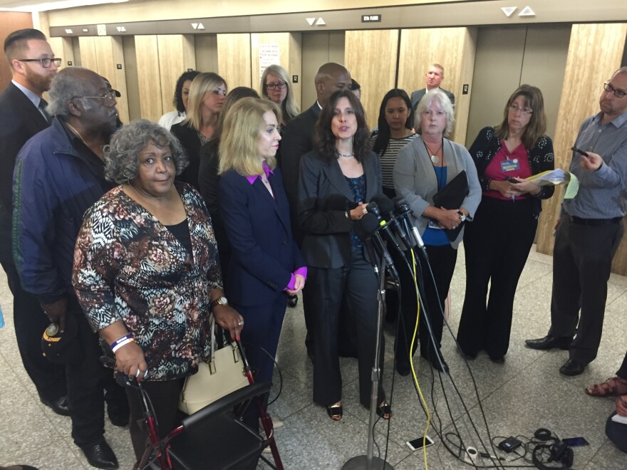 Lead prosecutor Beth Silverman is surrounded by colleagues and victims' family members after a jury delivered the death penalty to Lonnie Franklin Jr. (AKA the Grim Sleeper), who was convicted of murdering 10 women in South L.A. from 1985 to 2007.