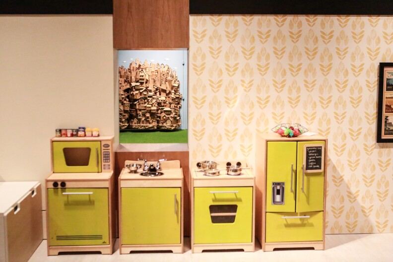 "Play" exhibit toy kitchen