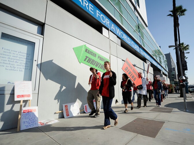 LOS ANGELES, CA - JANUARY 31:  Unionized nurses and healthcare workers from the Kaiser Permanente Los Angeles Medical Center take part in a 24-hour strike on January 31, 2012 in Los Angeles, California. Unionized healthcare from 160 Kaiser Permanente facilities statewide have gone on strike for 24-hours over a contract dispute with Kaiser over proposed cuts in health-care and retirement benefits.  (Photo by Kevork Djansezian/Getty Images)