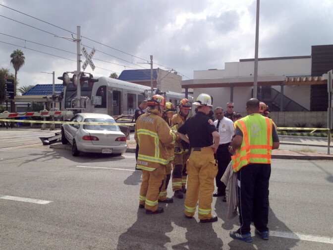 A Metro train collided with a Toyota Corolla Sunday, briefly shutting down service on the Gold Line. 