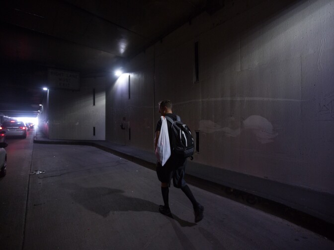 A man walks through the Sepulveda tunnel near LAX on November 1st, 2013.