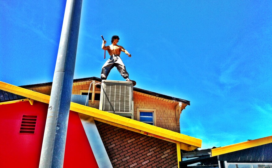 Bruce Lee, Chinese martial arts hero, adorning now defunct Japanese restaurant.