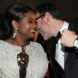 Octavia Spencer (L), winner for Best Actress in a Supporting Role for "The Help," and Michel Hazanavicius (R) winner for Best Writing (Original Screenplay) for "The Artist," share a moment at the Governor's Ball after the 84th Annual Academy Awards  on February 26, 2012 in Hollywood, California. AFP PHOTO/ Valerie Macon (Photo credit should read VALERIE MACON/AFP/Getty Images)
