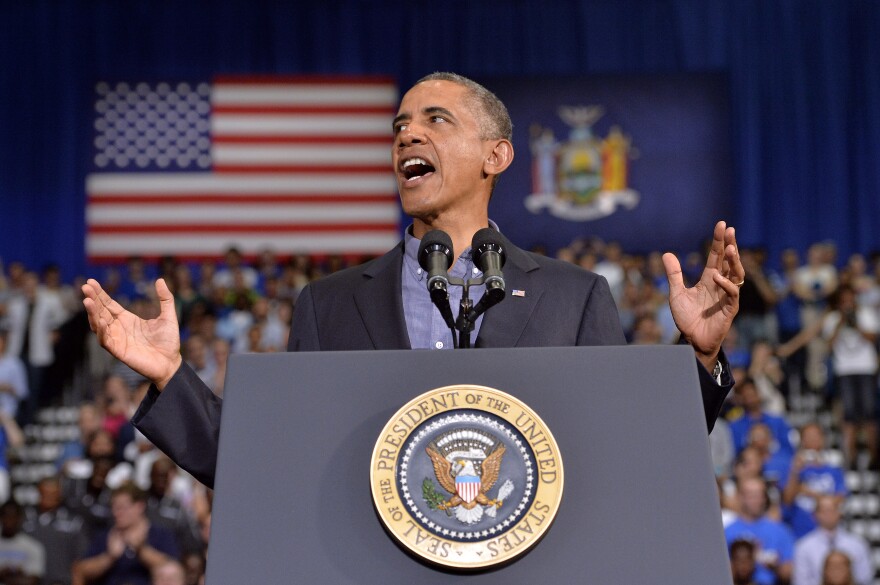 US President Barack Obama speaks on education at University of Buffalo, the State University of New York, on August 22, 2013 in Buffalo, New York. Obama is on a two-day bus tour through New York and Pennsylvania to discuss his plan to make college more affordable, tackle rising costs, and improve value for students and their families. 