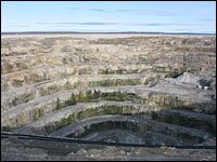 Diavik's pit mine in Canada's Northwest Territories is made of a conical spiral of steps, or "benches." Because of the strength of the rock in this mine, each step is about 100 feet tall.