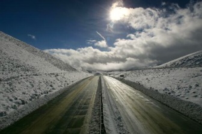 Interstate 5, the main route between Los Angeles and Sacramento and San Francisco, stands empty - closed by snow and ice - in Frazier Park, California.