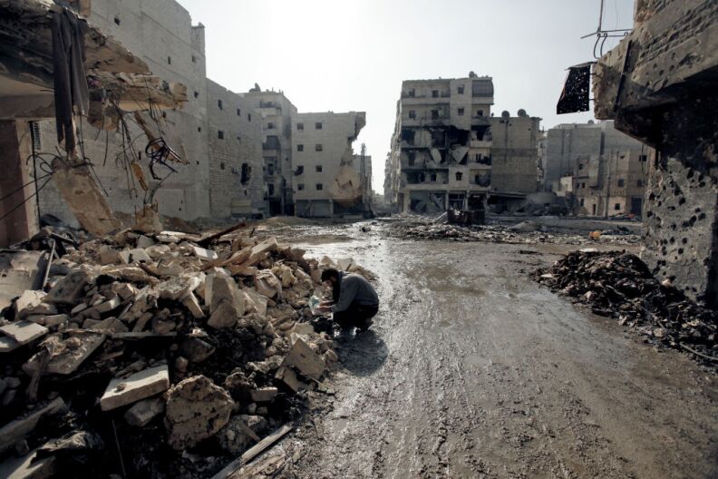 The U.S. and Germany said Friday that Russia must not provide the Assad regime with an advanced air defense system that they believe could prolong Syria's civil war. (Photo: A man is seen in the al-Amirya neighborhood of the city of Aleppo on December 2, 2012.) 