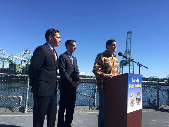 From left: Long Beach Mayor Robert Garcia, Los Angeles Mayor Eric Garcetti, and ILWU Local 13 President Bobby Olvera on the deck of the USS Iowa at the Port of Los Angeles. 
