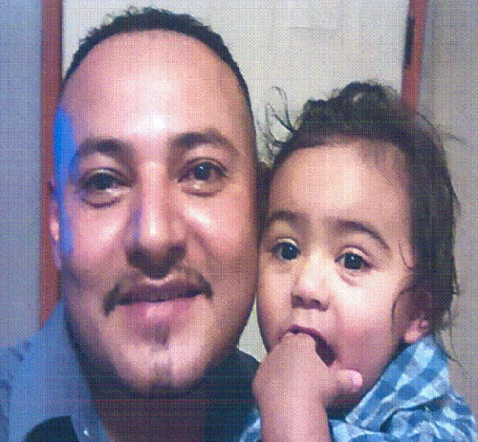 Giovanny Santiago, pictured with son Jayden, is wanted by police for attempted murder and kidnapping.  