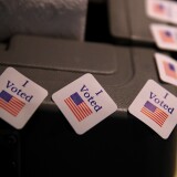  I voted stickers are displayed on a voting machine as democratic senatorial candidate Doug Jones casts his ballot at Brookwood Baptist Church on December 12, 2017 in Mountain Brook, Alabama.