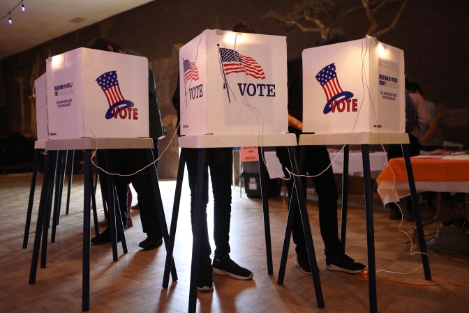 LOS ANGELES, CA - JUNE 05:  Voters cast their ballots at a Masonic Lodge on June 5, 2018 in Los Angeles, California. California could play a determining role in upsetting Republican control the U.S. Congress, as Democrats hope to win 10 of the 14 seats held by Republicans.  (Photo by Mario Tama/Getty Images)