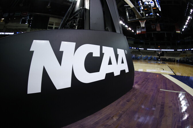INDIANAPOLIS, INDIANA - MARCH 21: The NCAA logo is seen on the basket stanchion before the game between the Oral Roberts Golden Eagles and the Florida Gators in the second round game of the 2021 NCAA Men's Basketball Tournament at Indiana Farmers Coliseum on March 21, 2021 in Indianapolis, Indiana. (Photo by Maddie Meyer/Getty Images)