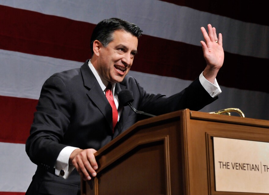 LAS VEGAS - NOVEMBER 02:  Republican Nevada Governor-elect Brian Sandoval gives his victory speech at the Nevada Republican Party's election results watch party at the Venetian Resort Hotel Casinio on November 2, 2010 in Las Vegas, Nevada. Sandoval defeated Democrat Rory Reid to become the first Hispanic to hold office as Nevada State governor.  (Photo by David Becker/Getty Images) *** Local Caption *** Brian Sandoval