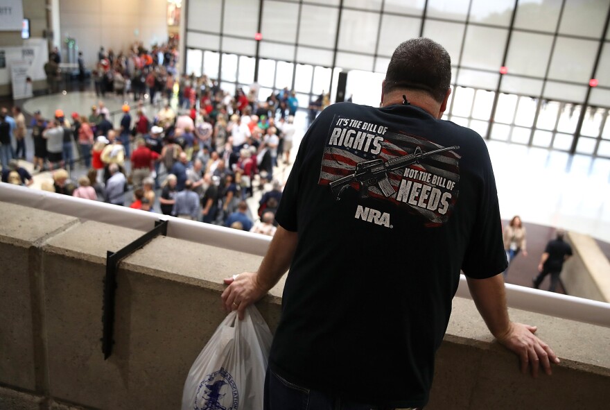 DALLAS, TX - MAY 04:  An attendee looks at a line to enter the NRA-ILA Leadership Forum during the NRA Annual Meeting & Exhibits at the Kay Bailey Hutchison Convention Center on May 4, 2018 in Dallas, Texas.  The National Rifle Association's annual meeting and exhibit runs through Sunday. (Photo by Justin Sullivan/Getty Images)