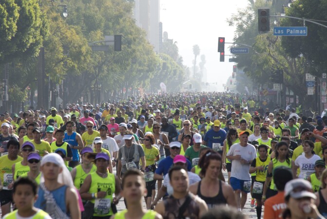File: Some of the participants running down Hollywood boulevard during the annual Asics L.A. Marathon on March 17, 2013 in Hollywood , California. The marathon, attended by over 24 thousand participants, started at Dodger's stadium in Los Angeles and finished in Santa Monica pier. 