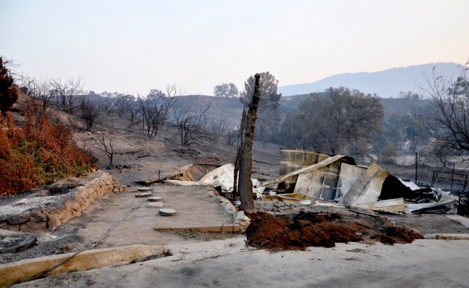 Many of the houses that burned in Ventura County, like this one off Highway 150 in the Upper Ojai Valley, complied with the county's strict brush clearing policies.
