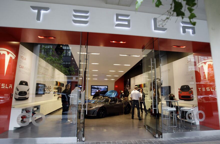 A Tesla Motors showroom in San Jose, Calif. Car dealers in New York and Massachusetts have filed a lawsuit that seeks to block Tesla from selling its vehicles in those states.