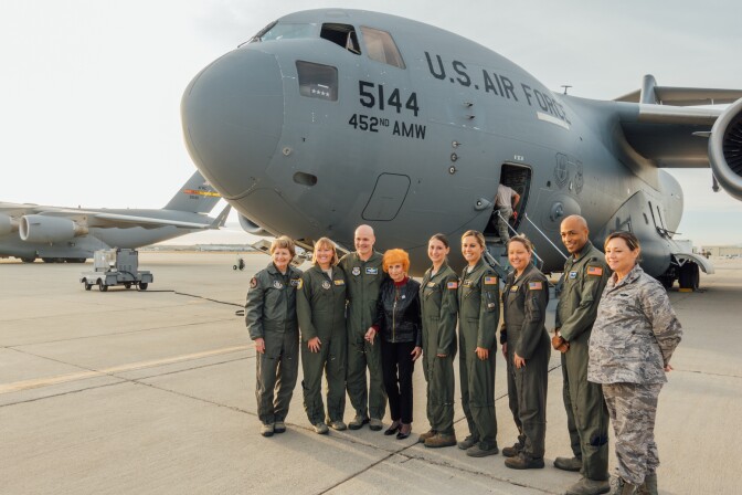 Elinor Otto (fourth from the left) poses with members of the flight crew and Air Force Reserve officials, including Lt. Gen. Maryanne Miller (left), the first female commander of the Air Force Reserve.