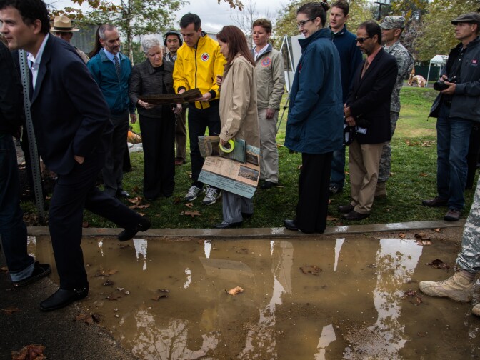 Los Angeles Mayor Eric Garcetti shows Environmental Protection Agency Administrator Gina McCarthy a plan for the restoration of the Los Angeles River in Marsh Park on November 21.