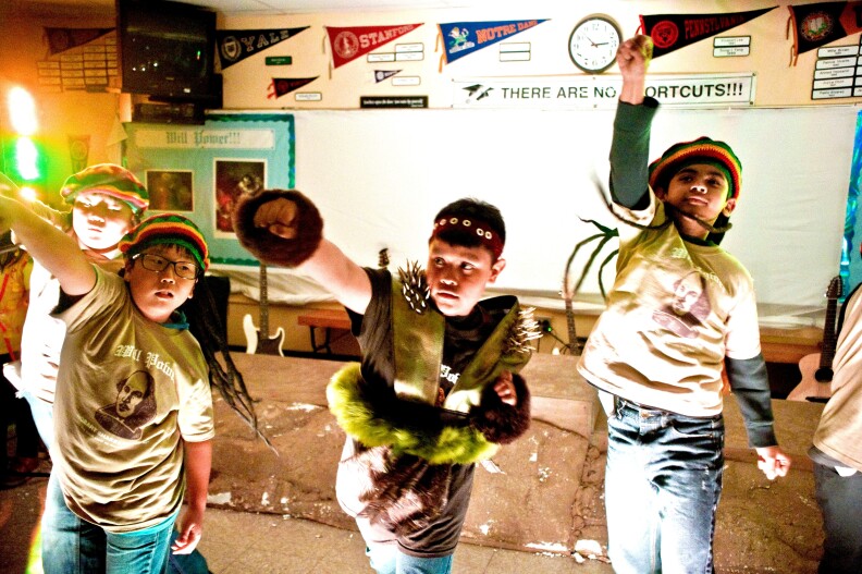 Brandeaux Lazo (center) performs with other students in The Tempest at Hobart Boulevard Elementary School.