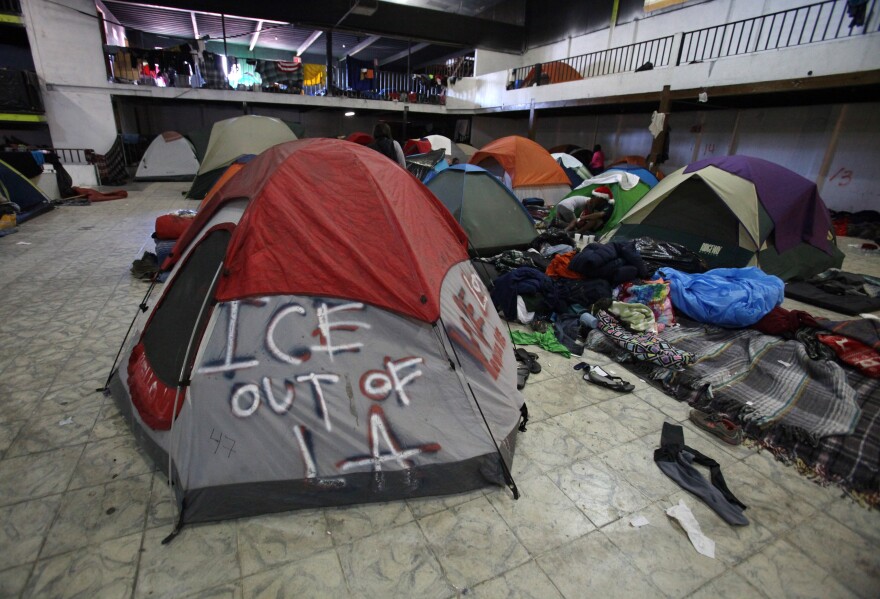 Tijuana, BAJA CALIFORNIA, Mexico - December 16, 2018.  At the El Barretal shelter in Matamoros, Tijuana, in one of the covered areas, migrants are happy to be out of the rainy plot in their original shelter at Benito Juarez Sports Complex near downtown.
    In Tijuana, Mexico, children members of the migrant caravan are learning to live in limbo as they move between shelters, settling in as much as possible to create a sense of normalcy, with help from NGOs, counselors and aid organizations. (Photo by Peggy Peattie)