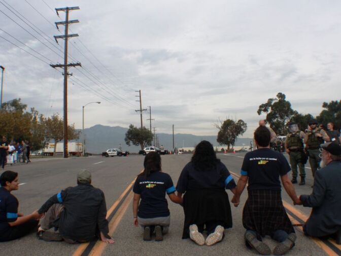 6 protestors block roadway outside Walmart-affiliated NFI Industries in Mira Loma during Tuesday labor protest. 

