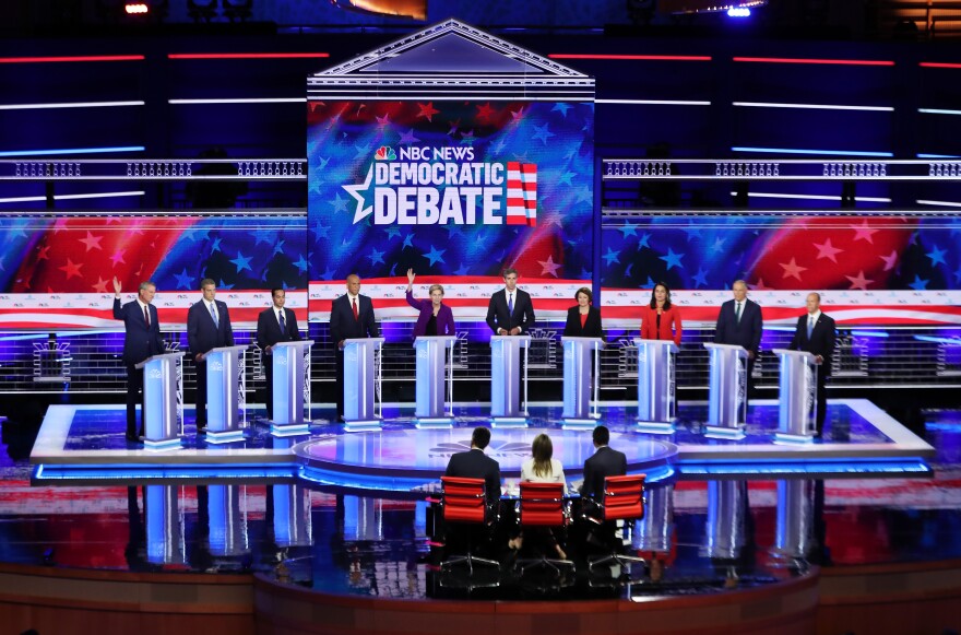 MIAMI, FLORIDA - JUNE 26: Democratic presidential candidates New York City Mayor Bill De Blasio (L-R), Rep. Tim Ryan (D-OH), former housing secretary Julian Castro, Sen. Cory Booker (D-NJ), Sen. Elizabeth Warren (D-MA), former Texas congressman Beto O'Rourke, Sen. Amy Klobuchar (D-MN), Rep. Tulsi Gabbard (D-HI), Washington Gov. Jay Inslee, and former Maryland congressman John Delaney take part in the first night of the Democratic presidential debate on June 26, 2019 in Miami, Florida.  A field of 20 Democratic presidential candidates was split into two groups of 10 for the first debate of the 2020 election, taking place over two nights at Knight Concert Hall of the Adrienne Arsht Center for the Performing Arts of Miami-Dade County, hosted by NBC News, MSNBC, and Telemundo. (Photo by Joe Raedle/Getty Images)