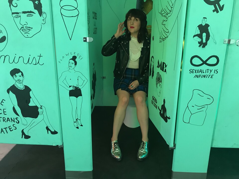 Piera Gelardi sits in a of a high school bathroom and listens to first hand accounts of gender self-discovery on headphones. Gender Neutral is in collaboration with Emmy-award wining director Jill Soloway of “Transparent” and artist Xavier Schipani. Photo credit: Adriana Cargill