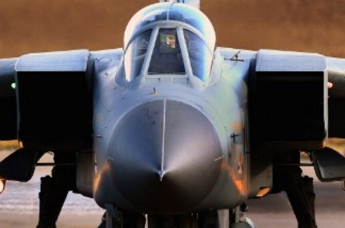 A pilot lands a RAF Tornados at Lossiemouth air base on March 18, 2011 in Lossiemouth, Scotland.