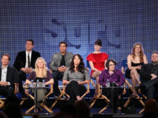 Actor Eric Stoltz, actor Sasha Roiz, actress Paula Malcomson, actor Esai Morales, actress Polly Walker, actress Alessandra Torresani, Executive Producer Jane Espenson, actress Magda Apanowicz and Executive Producer David Eick speak onstage for the Syfy Channel's television show 'Caprica' at the Langham Hotel on January 10, 2010 in Pasadena, California.