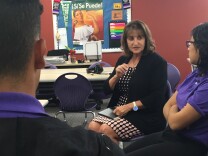 Jacqueline Elliott, co-founder of the Partners To Uplift Communities ("PUC") charter network, conducts a group exit interview with students at PUC Triumph Charter High School in Sylmar. She has held at least 60 such exit interviews with departing seniors from PUC high schools over the last six years.