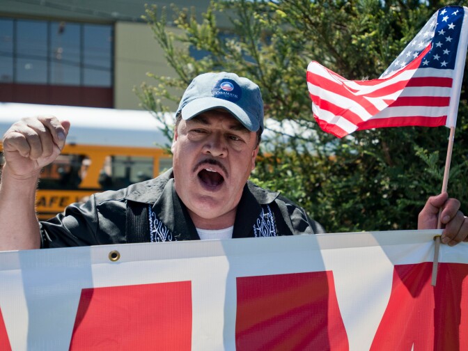 Juan Martinez attends Wednesday's march as part of five different organizations. Hundreds of immigration reform supporters took part in a march on Wednesday to Senator Diane Feinstein's LA office. The march coincides with a immigration reform rally in Washington D.C.