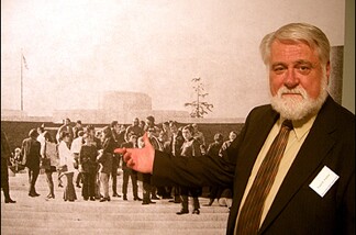 Former Norton Simon museum (nee Pasadena Art Museum) curator Fred Parker, in front of a photo of famous photographers gathered on the museum steps for a much earlier exhibit. Parker's not in the photo because he took it.