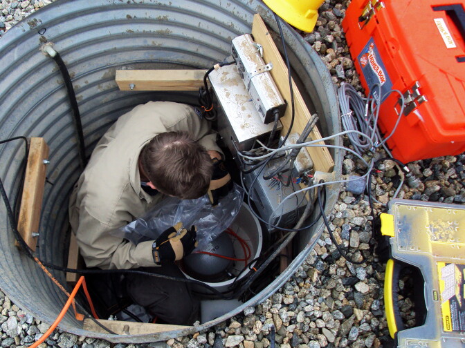 Russell Oliver removes the plastic from a brand new STS 2.5, a top of the line motion sensor. This sensor is part of a pilot system that could provide Californians with up to a minute of warning before an earthquake reaches them.