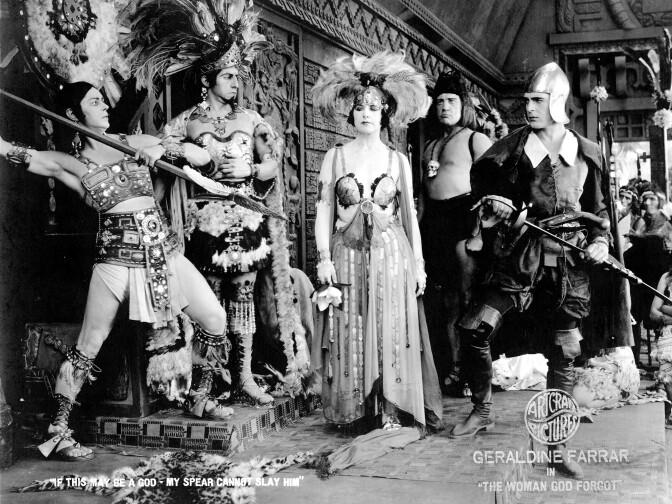 Theodore Kosloff, far left, wielding a spear in the silent movie "The Woman God Forgot."