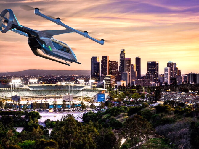 Uber partner, Embraer, showed its first electric vertical takeoff and landing vehicle. Developed with extensive input from potential urban air travelers about their desired experience, it's one of several designs Uber is considering for a flying version of its popular ride-hail service.