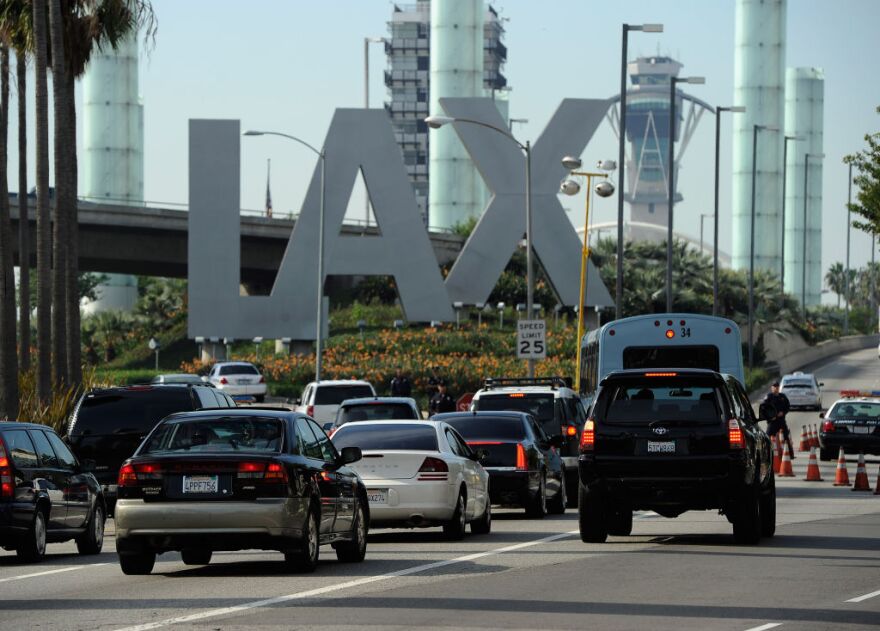 Travelers are stopped at a security check point at Los Angeles International Airport on November 23, 2011 in Los Angeles.