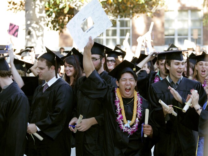 Students celebrate at the commencement ceremony at UCLA's School of Theater, Film and Television on June 17, 2005 in Los Angeles, California.