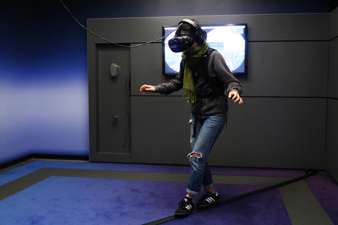 Paola Mardo tries "The Walk" VR experience at the IMAX VR Centre in Los Angeles.