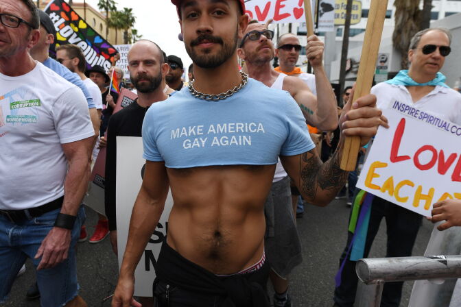 Members of the LGBTQ community and their supporters participate in the #ResistMarch at the 47th annual L.A. Pride Festival in West Hollywood, California on June 11, 2017.