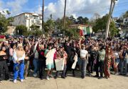 a group of some 100 people gathered to take a pic.