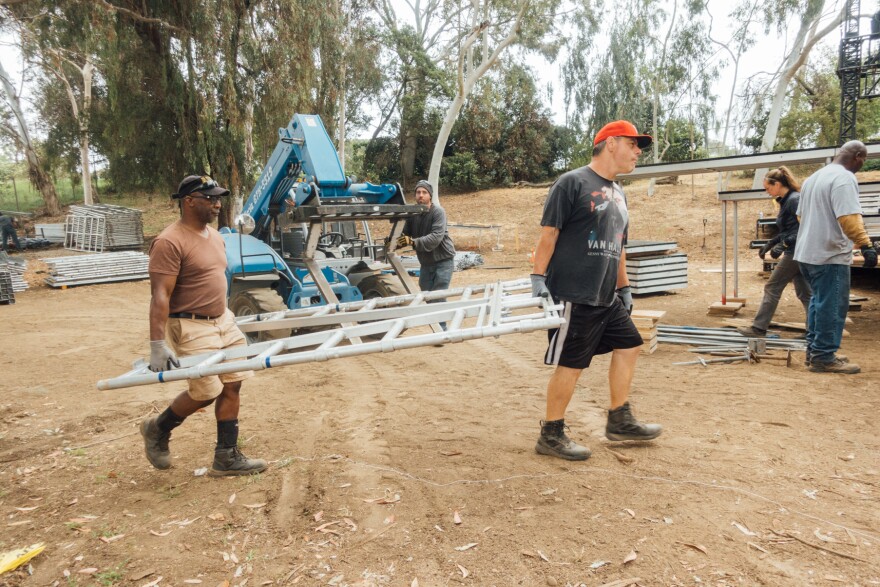 Donnie Williams (left) and Shawn Mckelvey working behind-the-scenes on Henry IV for the Shakespeare Center of Los Angeles.