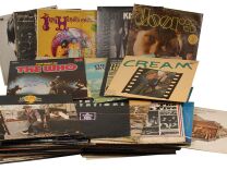 Joey Ramone’s personal record collection, consisting of 97 records in their original album sleeves. Some artists include Led Zeppelin, the Who, T. Rex, Cream, Bob Dylan, The Human League, Iggy Pop, the Doors, the Temptations, and the Ventures. In overall very good to fine condition, with various scattered creases and small tears to sleeves, affixed prices tags and labels, and marks to vinyl. Provenance: Joey Ramone Estate. Accompanied by a letter signed by Joey’s brother Mickey attesting to the collection’s authenticity.