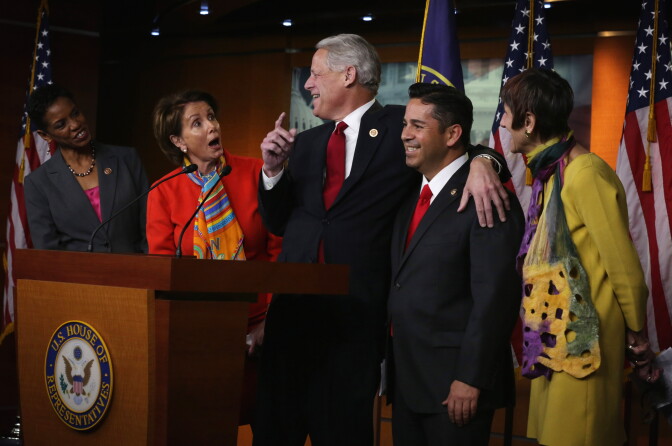 WASHINGTON, DC - NOVEMBER 17:  U.S. House Minority Leader Rep. Nancy Pelosi (D-CA) (2nd L), Rep. Ben Ray Luj?n (D-NM) (4th L), Rep. Steve Israel (D-NY) (3rd L), Rep. Rosa DeLauro (D-CT) (R), and Rep. Donna Edwards (D-MD) (L) share a moment during a news conference to announce new members of the House Democratic leadership team November 17, 2014 on Capitol Hill in Washington, DC. House Democrats have tapped Rep. Luj?n to be the new chair of Democratic Congressional Campaign Committee, Rep. Israel to a newly created position to handle policy communications, and Rep. DeLauro and Rep. Edwards to co-chair the policy and steering committee.  (Photo by Alex Wong/Getty Images)
