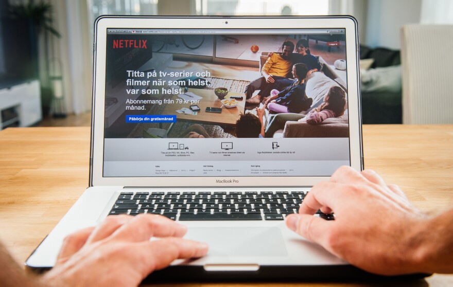 An image showing the on-demand internet streaming media provider, Netflix, on a laptop screen.