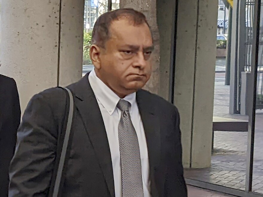 Ramesh "Sunny" Balwani walks into federal court in San Jose, Calif. on June 24, 2022.