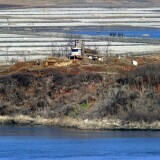 A North Korean guard post in the border county of Kaepoong is seen from a South Korean observation post in Paju near the Demilitarized Zone (DMZ) dividing the two Koreas on March 29, 2013. North Korean leader Kim Jong-Un ordered preparations on March 29. Japan worries North Korea could strike U.S. military installations in that country.