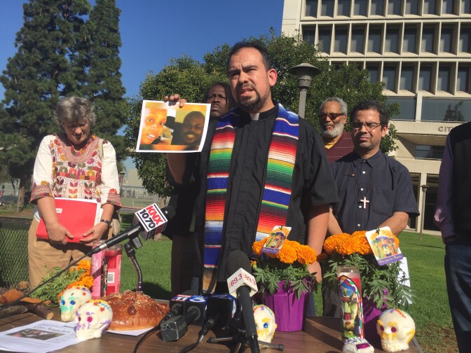 Rev. Francisco Garcia of Holy Faith Episcopal Church led a protest outside Inglewood City Hall over the police killing of Kisha Michael and Marquintan Sandlin in February. (11-02-0-16)