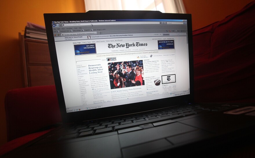 NEW YORK - JANUARY 20:  In this photo illustration the NYTimes.com Web site is displayed on a laptop January 20, 2010 in New York City. The New York Times Co. announced it will begin charging readers of its online content at the start of 2011.  (Photo Illustration by Mario Tama/Getty Images)